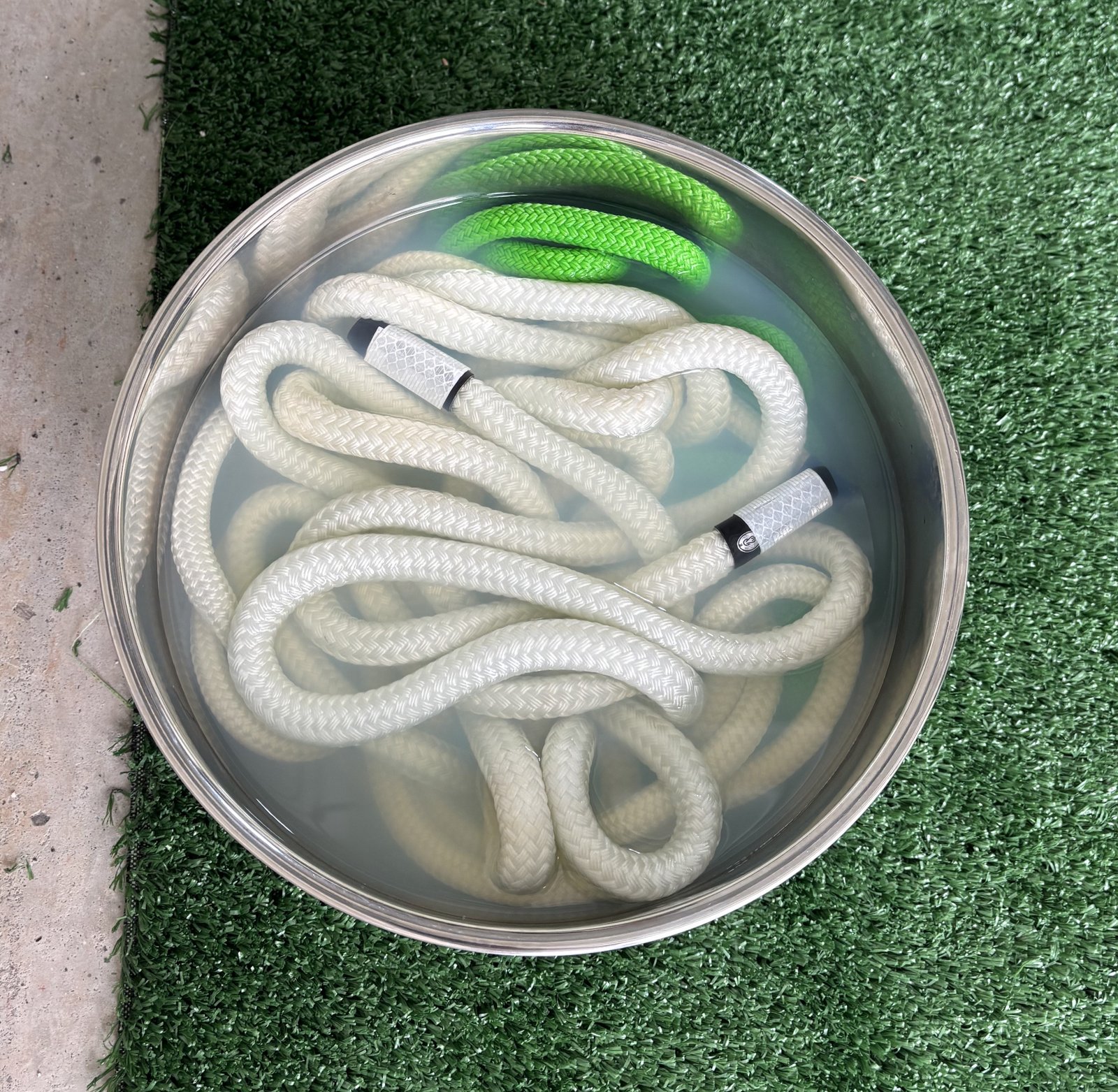 Wet aircraft tie-down rope conditioning for testing